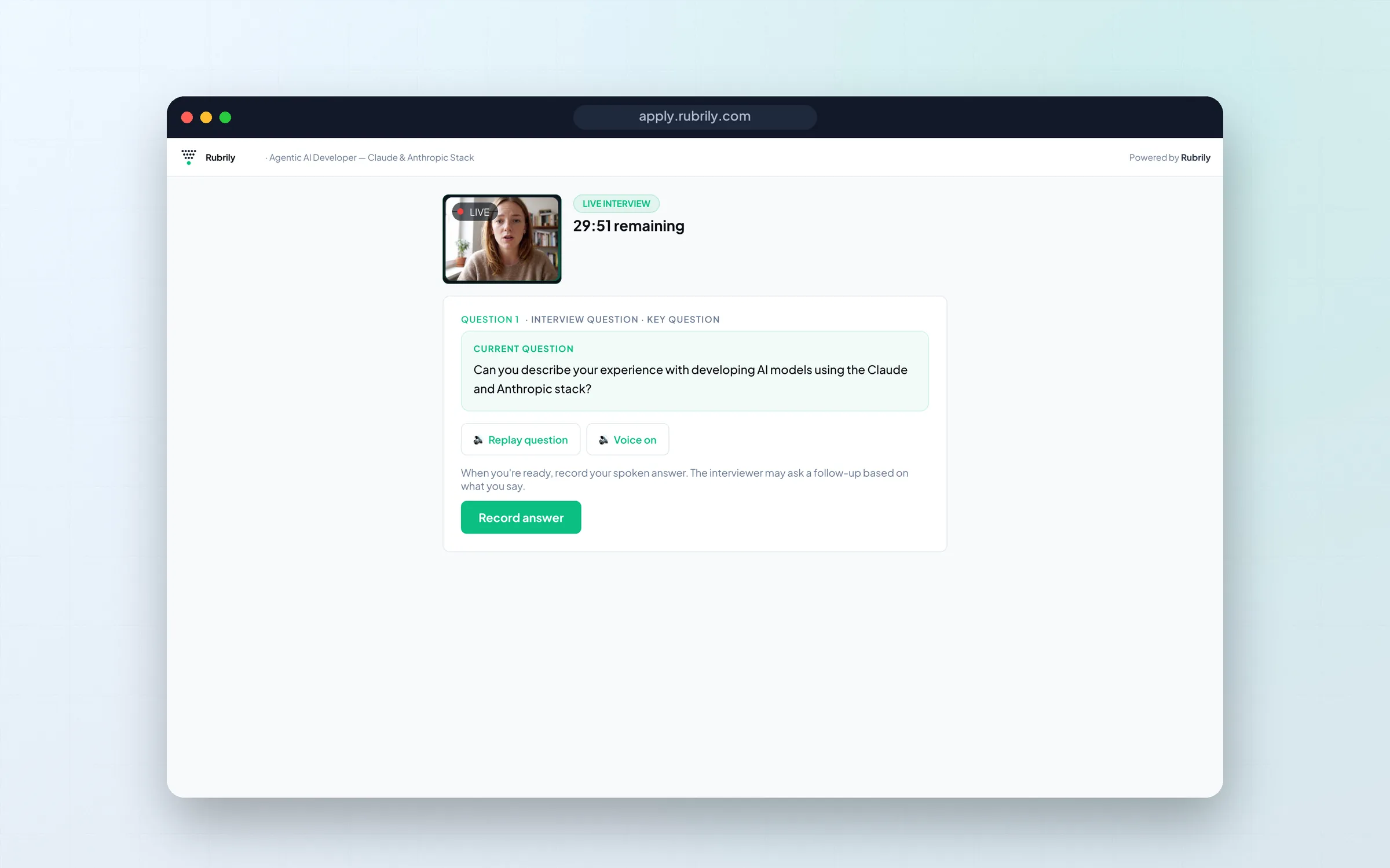 Live AI interview asking a candidate a question with a Record answer button.